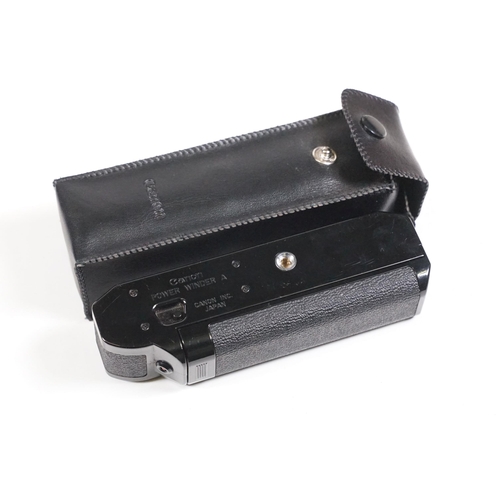 441 - Collection of cameras, lenses and equipment contained within a padded case to include Canon A-1 35mm... 