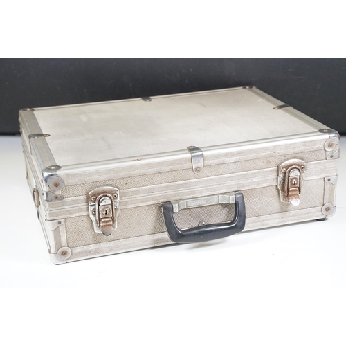 441 - Collection of cameras, lenses and equipment contained within a padded case to include Canon A-1 35mm... 