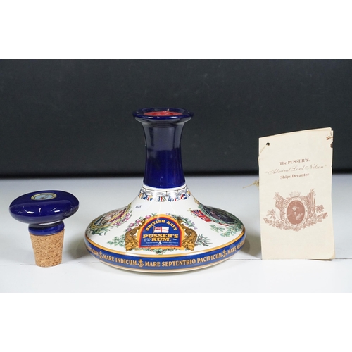 502 - Alcohol - The Pusser's Admiral Lord Nelson Ships Decanter (Sealed), together with a HMS Victory Traf... 