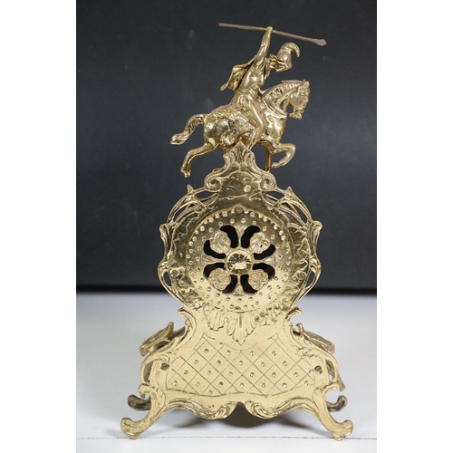 419 - Brass reproduction mantle clock together with matching candelabras