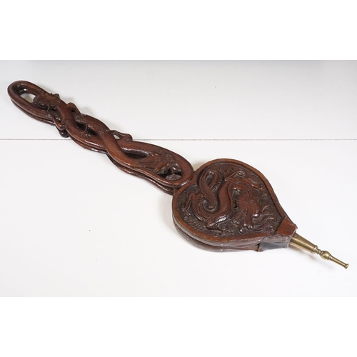 420 - Hand carved wooden Oriental fire bellows with dragon decoration