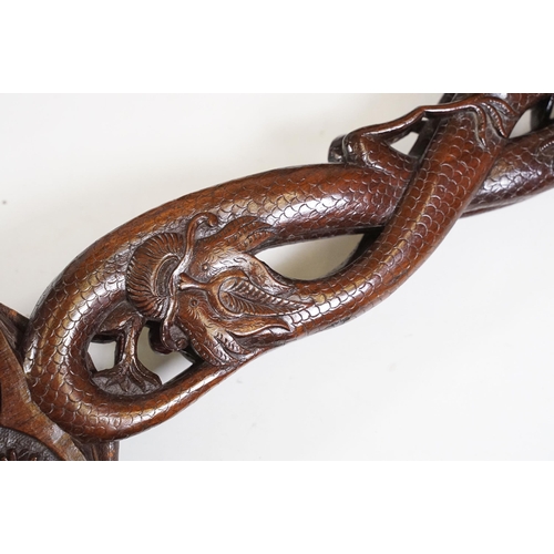 420 - Hand carved wooden Oriental fire bellows with dragon decoration