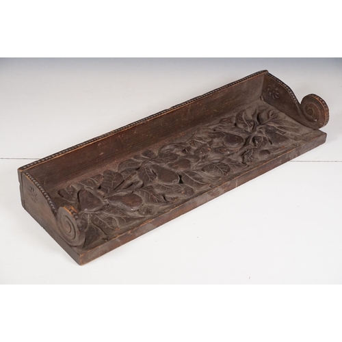 421 - Collection of treen items to include Early 20th Century Edwardian letter rack, pair of carved lion h... 