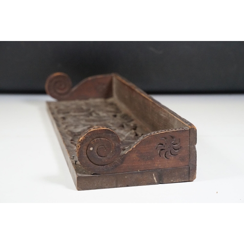 421 - Collection of treen items to include Early 20th Century Edwardian letter rack, pair of carved lion h... 