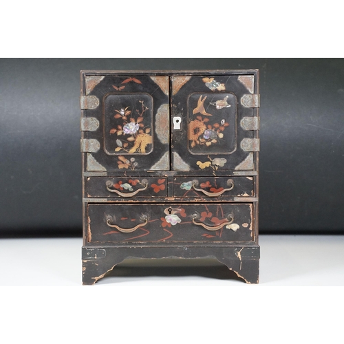 422 - Two wooden cabinets to include Chinese black lacquered jewellery cabinet with mother of pearl inlay ... 