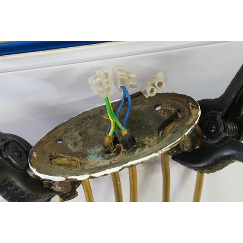 469 - Three early 20th Century rise and fall hall lights, each having two scrolled arms with cut glass sco... 