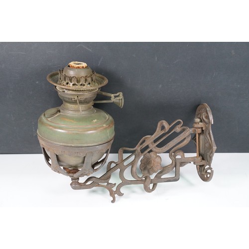 159 - Art nouveau late 19th century pierced iron wall bracket of foliate sinuous design, stamped with a re... 