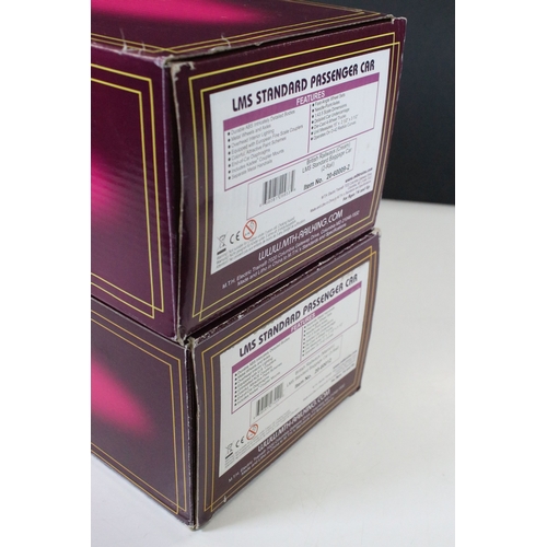 129 - Two boxed Darstaed O gauge MK1 Suburban maroon unlined coaches to include D23-1-2 BS2 and D23-3-2 CL... 