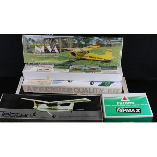 310 - Six boxed Radio Controlled model kit aircrafts to include Keil Kraft New Super 60 Radio Control Trai... 