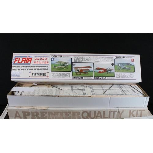 310 - Six boxed Radio Controlled model kit aircrafts to include Keil Kraft New Super 60 Radio Control Trai... 