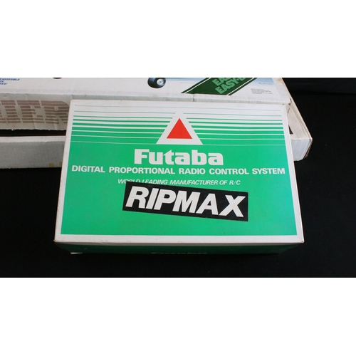 310 - Six boxed Radio Controlled model kit aircrafts to include Keil Kraft New Super 60 Radio Control Trai... 