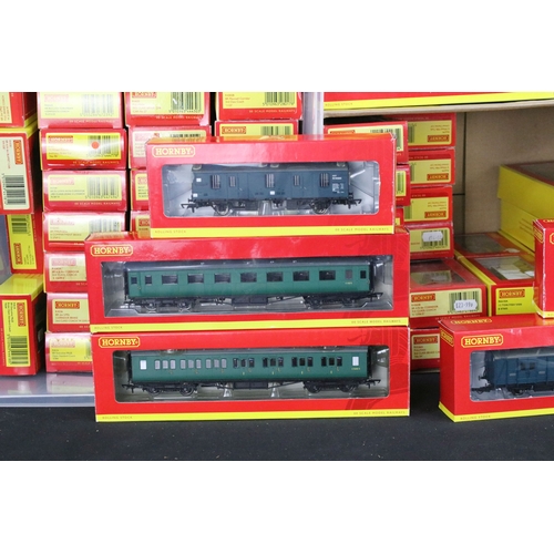 136 - 69 Boxed Hornby OO gauge items of rolling stock to include R6484 KFA Container Wagon 93478, R4235 BE... 
