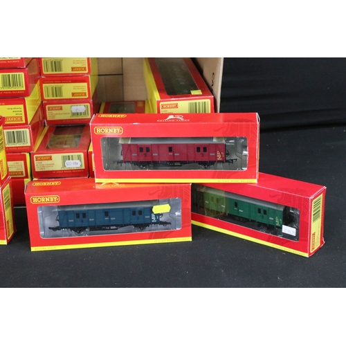 136 - 69 Boxed Hornby OO gauge items of rolling stock to include R6484 KFA Container Wagon 93478, R4235 BE... 