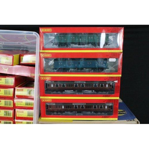136 - 69 Boxed Hornby OO gauge items of rolling stock to include R6484 KFA Container Wagon 93478, R4235 BE... 