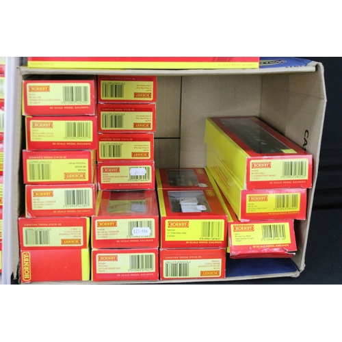 136 - 69 Boxed Hornby OO gauge items of rolling stock to include R6484 KFA Container Wagon 93478, R4235 BE... 