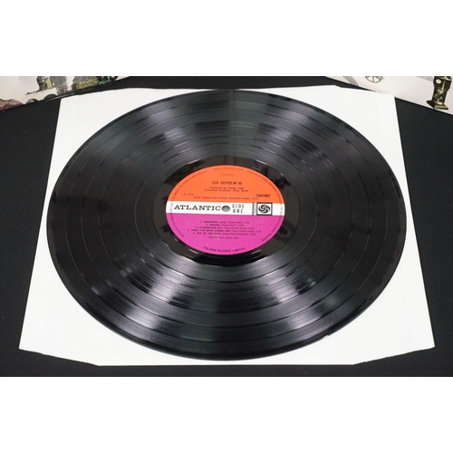 118 - Vinyl - 4 original pressing Led Zeppelin LPs (plum labels) to include Self Titled (grey strip to bot... 
