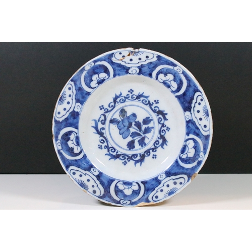 13 - Pair of 18th century delft blue and white plates with floral decoration, diameter approx. 23.5cm