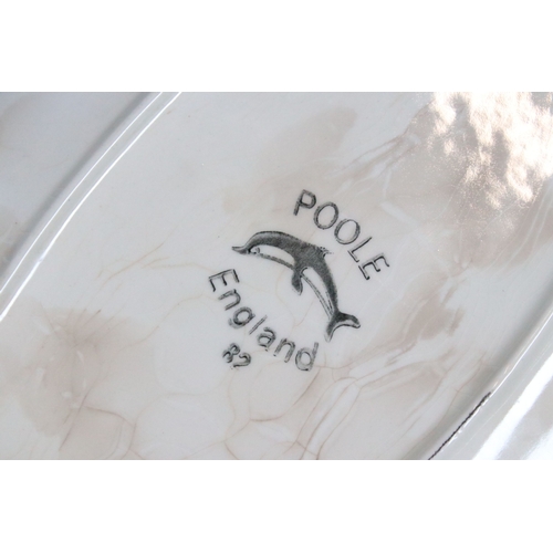 21 - Poole Pottery delphis leaf dish, shape 82, 43cm long together with Poole Pottery KW floral pattern p... 