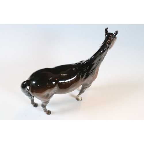 24 - Beswick horse figurines to include Exmoor example (2)