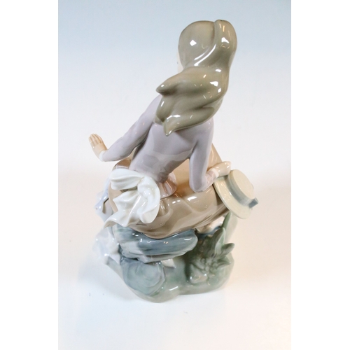27 - Lladro Nao 'Girl carrying water jar' bisque finish figurine, H 32cm together with Lladro 'Girl at th... 