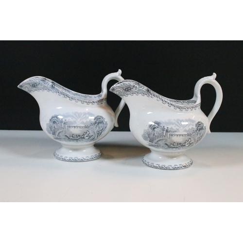 28 - Early 20th century transferware grey and white oval meat platter charger 45cm, together with two sau... 