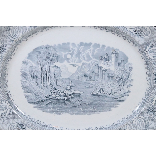 28 - Early 20th century transferware grey and white oval meat platter charger 45cm, together with two sau... 