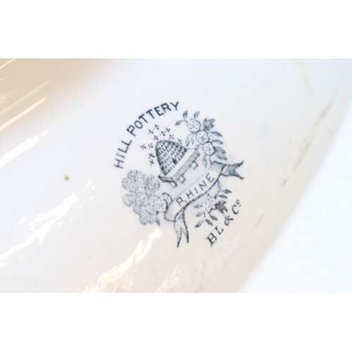 28 - Early 20th century transferware grey and white oval meat platter charger 45cm, together with two sau... 