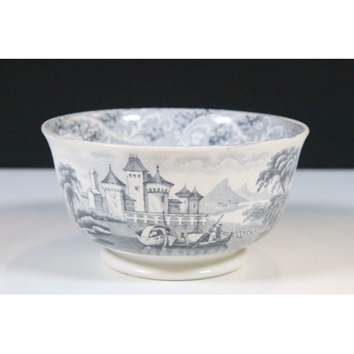 28 - Early 20th century transferware grey and white oval meat platter charger 45cm, together with two sau... 