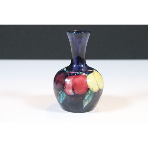 32 - Small Moorcroft 'Plum Wisteria' vase, stamped to base, H 9.5cm
