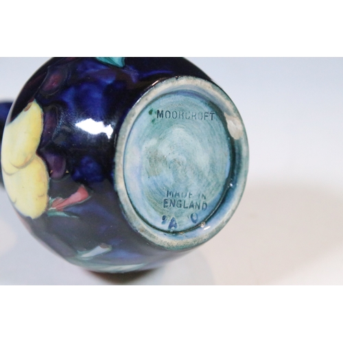 32 - Small Moorcroft 'Plum Wisteria' vase, stamped to base, H 9.5cm