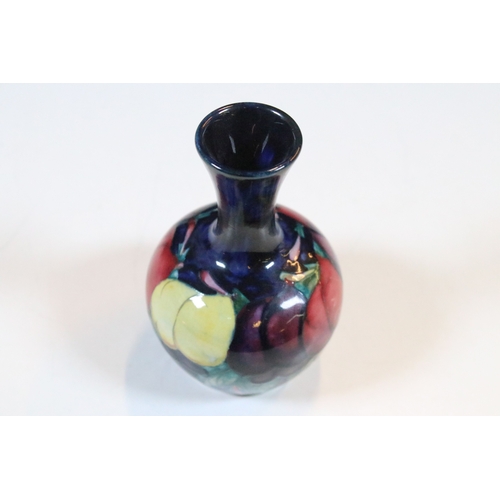 32 - Small Moorcroft 'Plum Wisteria' vase, stamped to base, H 9.5cm