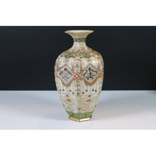 33 - Japanese Noritake items to include an ornate vase together with a pair of two handled vases with han... 