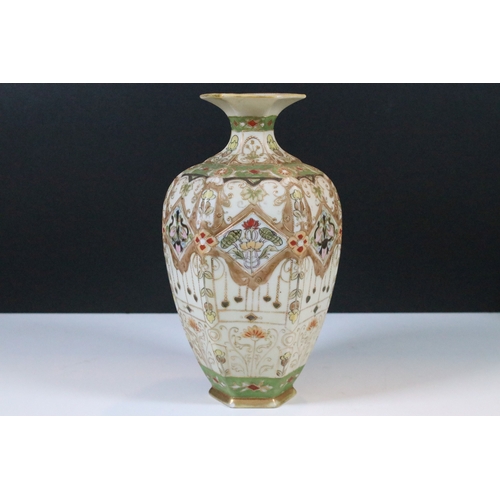 33 - Japanese Noritake items to include an ornate vase together with a pair of two handled vases with han... 