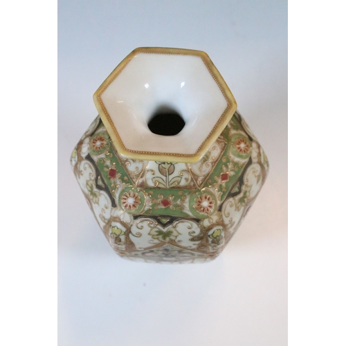 33 - Japanese Noritake items to include an ornate vase together with a pair of two handled vases with han... 