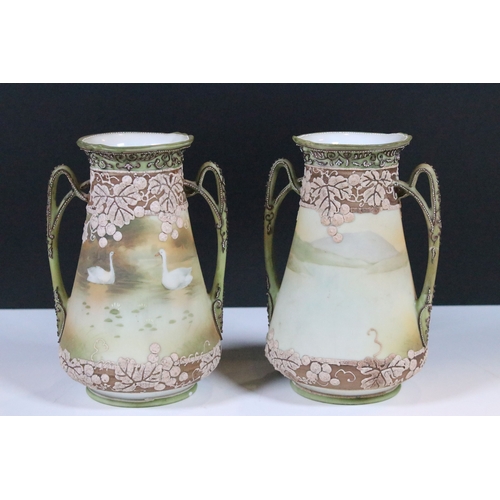 33 - Japanese Noritake items to include an ornate vase together with a pair of two handled vases with han... 