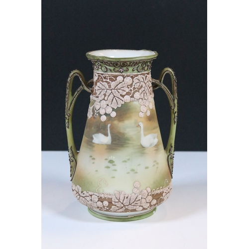 33 - Japanese Noritake items to include an ornate vase together with a pair of two handled vases with han... 