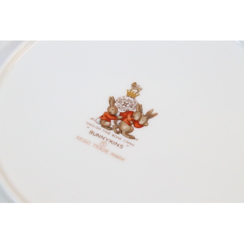 41 - Royal Doulton Bunnykins children's china to include two bowls, four plates, two cups and saucers and... 