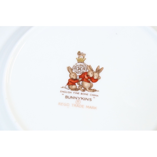 41 - Royal Doulton Bunnykins children's china to include two bowls, four plates, two cups and saucers and... 