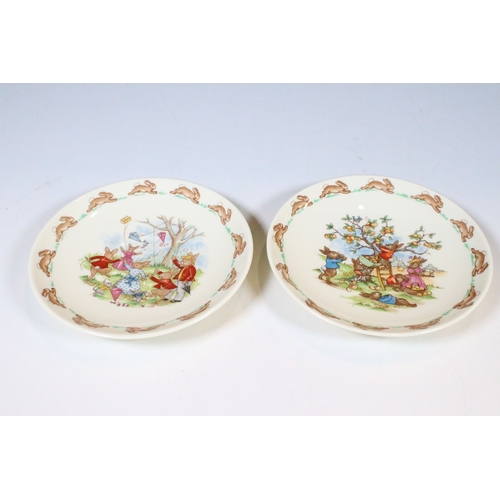 41 - Royal Doulton Bunnykins children's china to include two bowls, four plates, two cups and saucers and... 