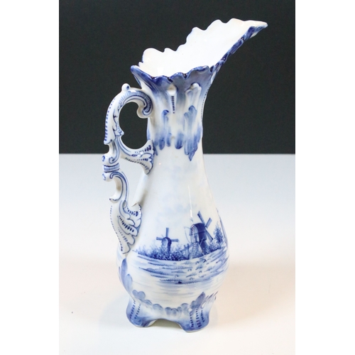44 - 20th century group of assorted form blue and white pattern Delft jars with Dutch coastal scene decor... 