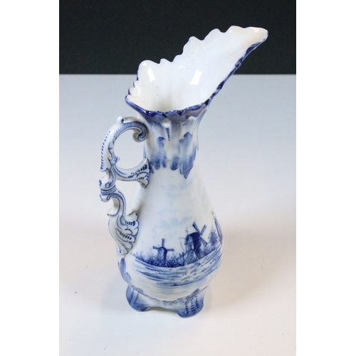 44 - 20th century group of assorted form blue and white pattern Delft jars with Dutch coastal scene decor... 