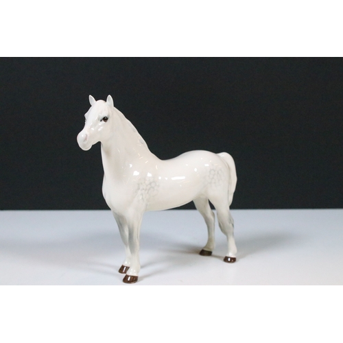 47 - Group of three white Beswick horses to include two foals and Welsh Mountain pony examples (3)