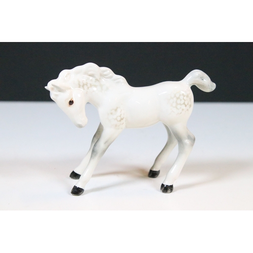47 - Group of three white Beswick horses to include two foals and Welsh Mountain pony examples (3)