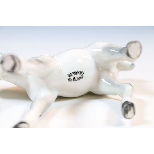 47 - Group of three white Beswick horses to include two foals and Welsh Mountain pony examples (3)