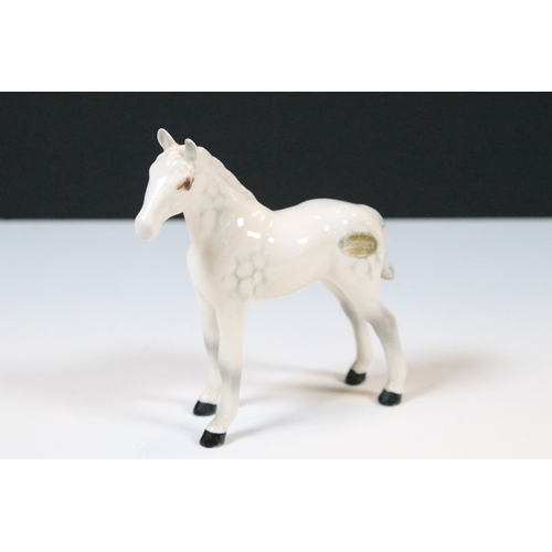 47 - Group of three white Beswick horses to include two foals and Welsh Mountain pony examples (3)