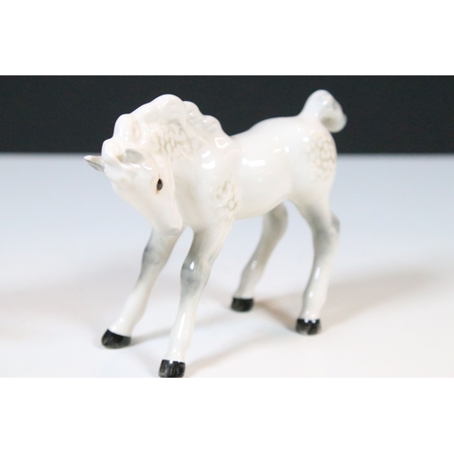 47 - Group of three white Beswick horses to include two foals and Welsh Mountain pony examples (3)