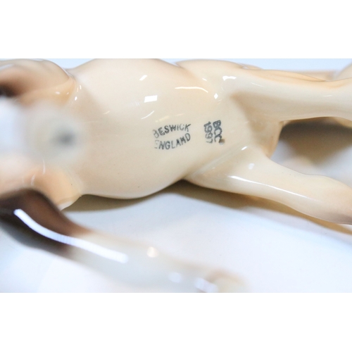 5 - Beswick gloss finish foal and mare figurines, marked to underside BCC 1997 (2)