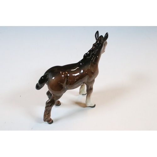 57 - Group of three Beswick horse figurines to include a Palamino example together with decorative Beswic... 
