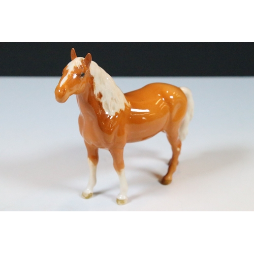 57 - Group of three Beswick horse figurines to include a Palamino example together with decorative Beswic... 