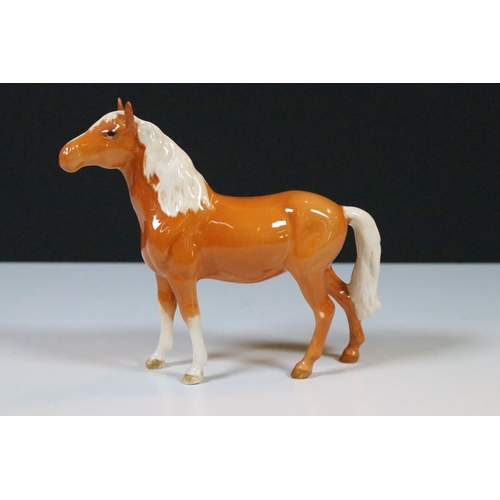 57 - Group of three Beswick horse figurines to include a Palamino example together with decorative Beswic... 